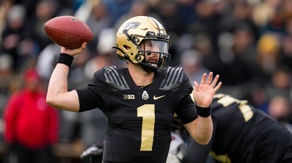 Purdue quarterback Hudson Card (1) throws against Indiana during the first half of an NCAA...