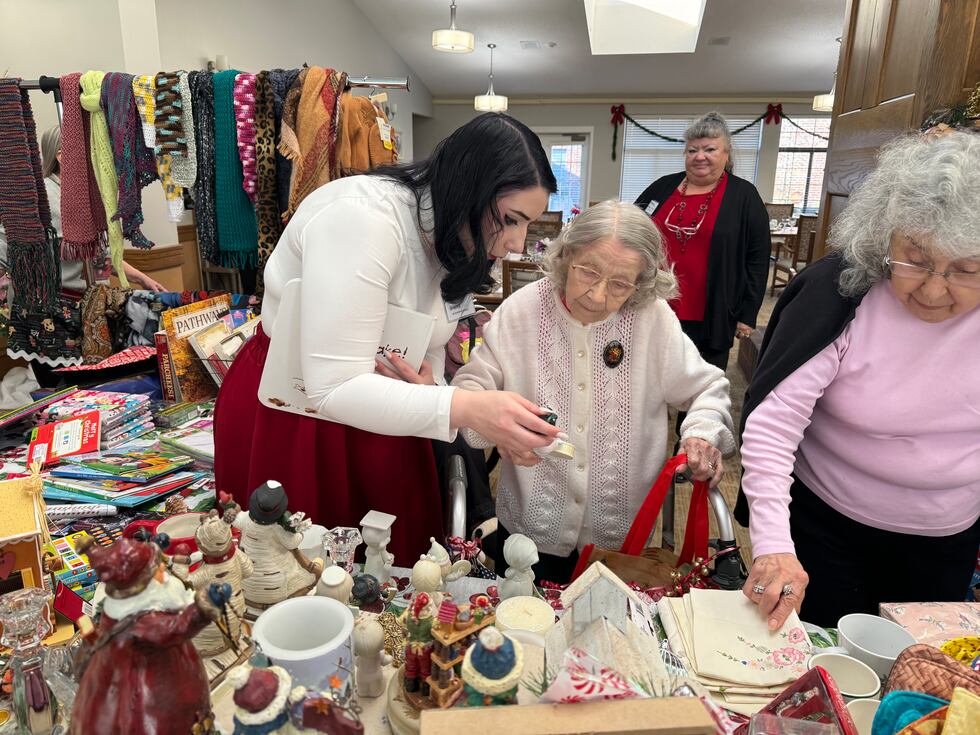 Westgate Assisted Living resident, Clara Horvakh, shops at the Gwen's Gift event.